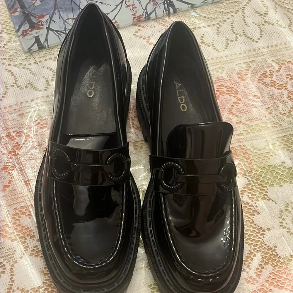 Aldo Glossy Black Patent Slip-On Loafers with Ring Accent